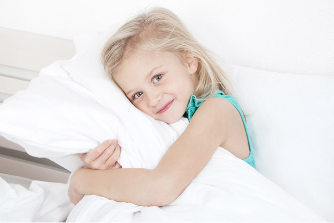 At what age should children use a pillow?