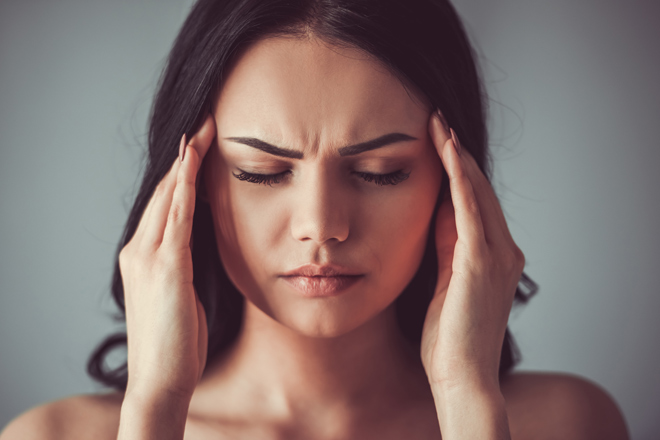Why does a long sleep cause headaches?