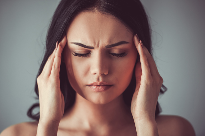 Why does a long sleep cause headaches?